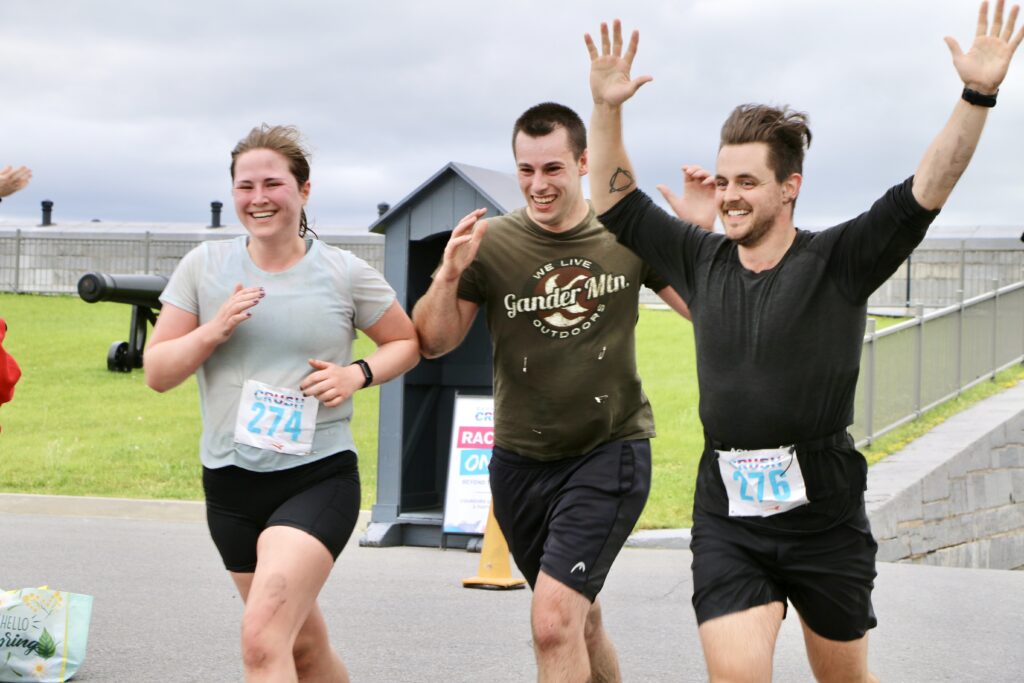 Cannonball Crush participants crossing the finish line