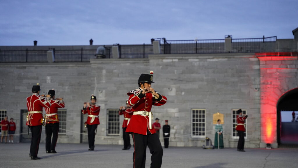 Fort Henry guard playing the flute.